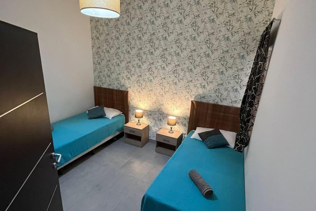 Postel nebo postele na pokoji v ubytování Serenity Sea-view Maisonette