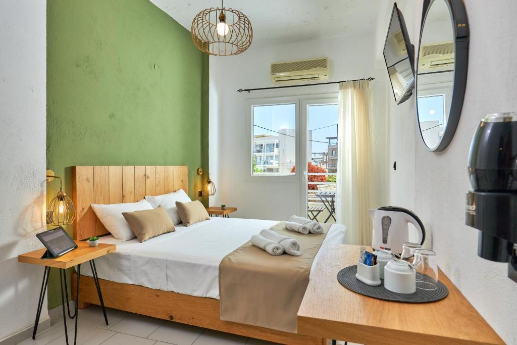 Postel nebo postele na pokoji v ubytování Charm Hotel, Hersonissos