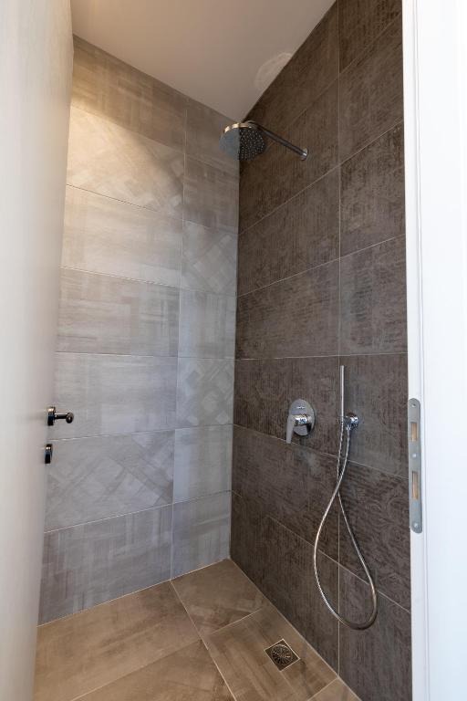 Koupelna v ubytování Bonsai Luxury Suites