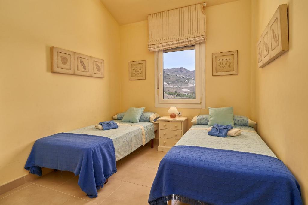 Postel nebo postele na pokoji v ubytování Casa Fuentes 2 B2