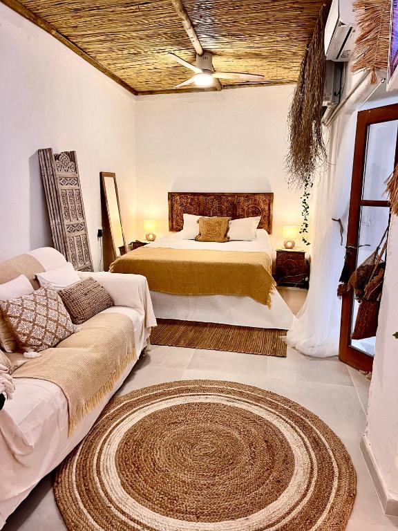 Postel nebo postele na pokoji v ubytování Arcos de Tarifa, Casco historico