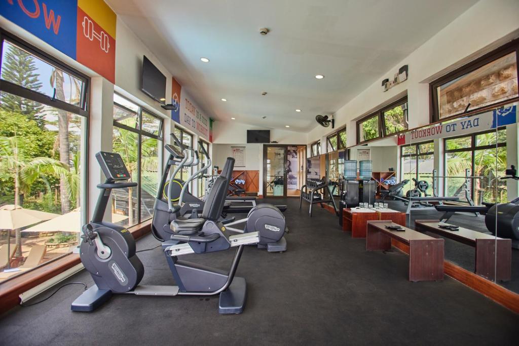 a gym with several treadmills and elliptical machines at Aero Club of East Africa in Nairobi