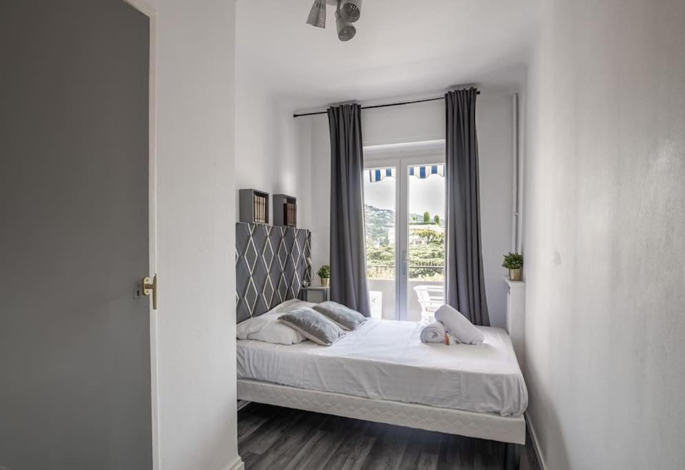 Cama ou camas em um quarto em Bel appartement centre ville de Cannes