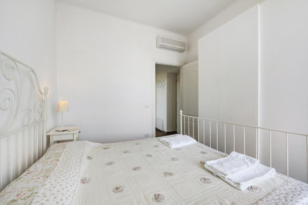 Łóżko lub łóżka w pokoju w obiekcie Casa Mare