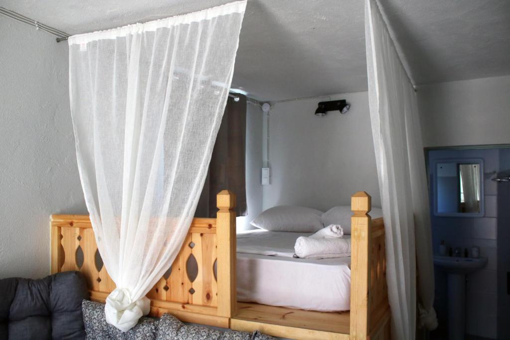 Postel nebo postele na pokoji v ubytování Volcano View Nisyros
