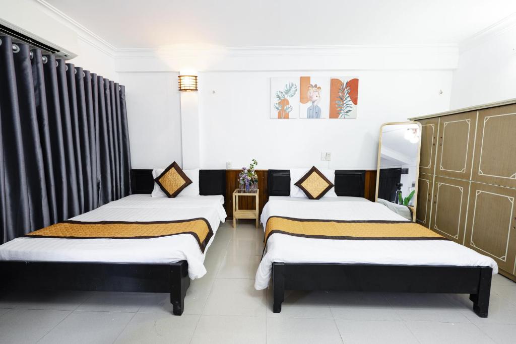 Postel nebo postele na pokoji v ubytování Casablanca Hotel