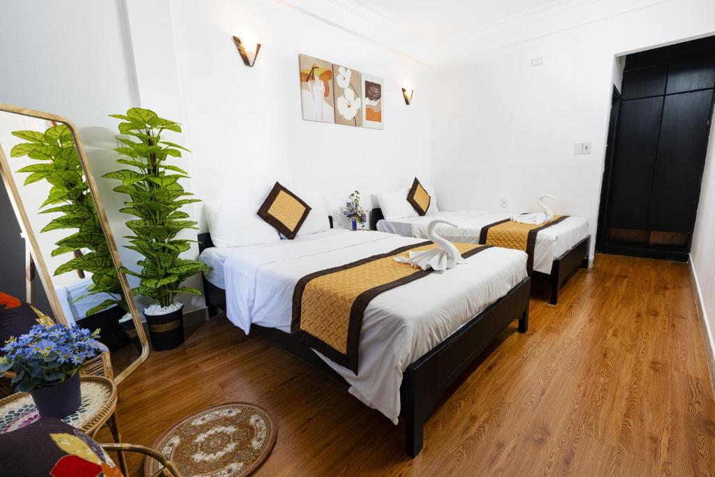 Postel nebo postele na pokoji v ubytování Casablanca Hotel