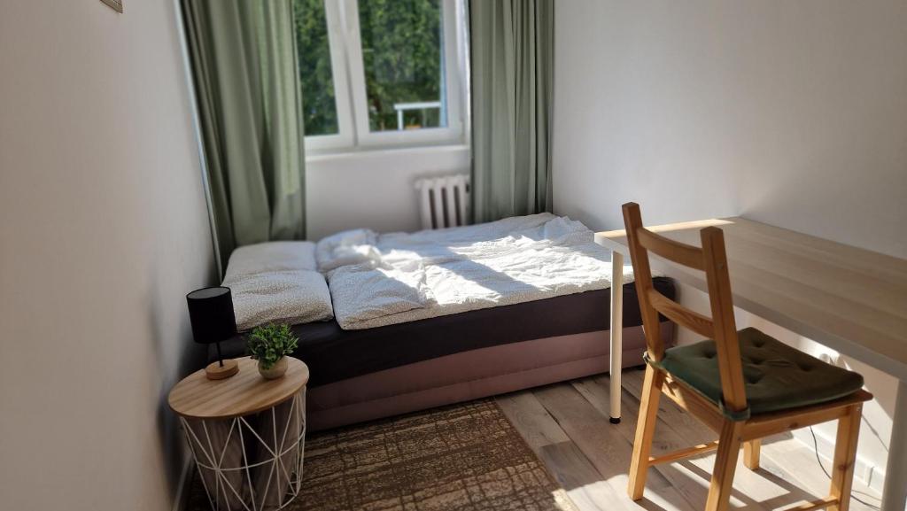 Posteľ alebo postele v izbe v ubytovaní Apartament Morski