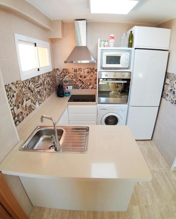 Kuchyňa alebo kuchynka v ubytovaní ARROYO NEW APARTMENT BENALMÁDENA, MÁLAGA - Sea view, pool, WIFI