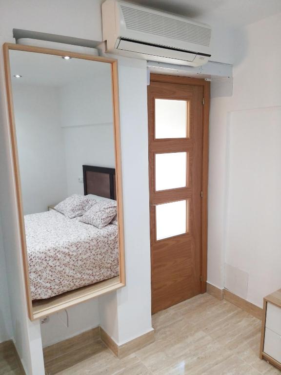 Posteľ alebo postele v izbe v ubytovaní ARROYO NEW APARTMENT BENALMÁDENA, MÁLAGA - Sea view, pool, WIFI