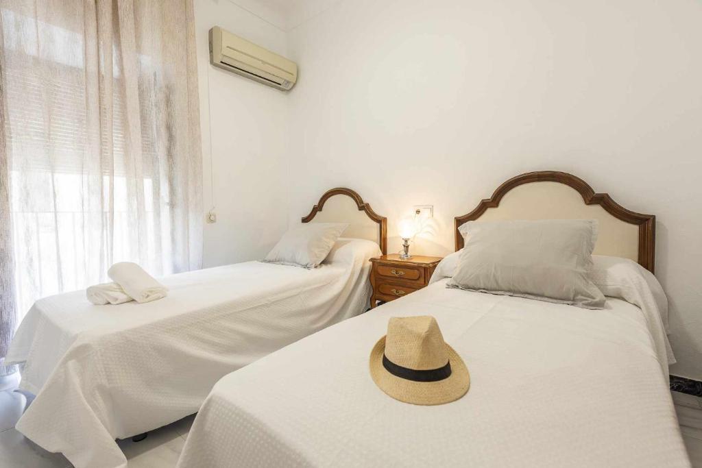 Postel nebo postele na pokoji v ubytování Casa Rural Berraquero