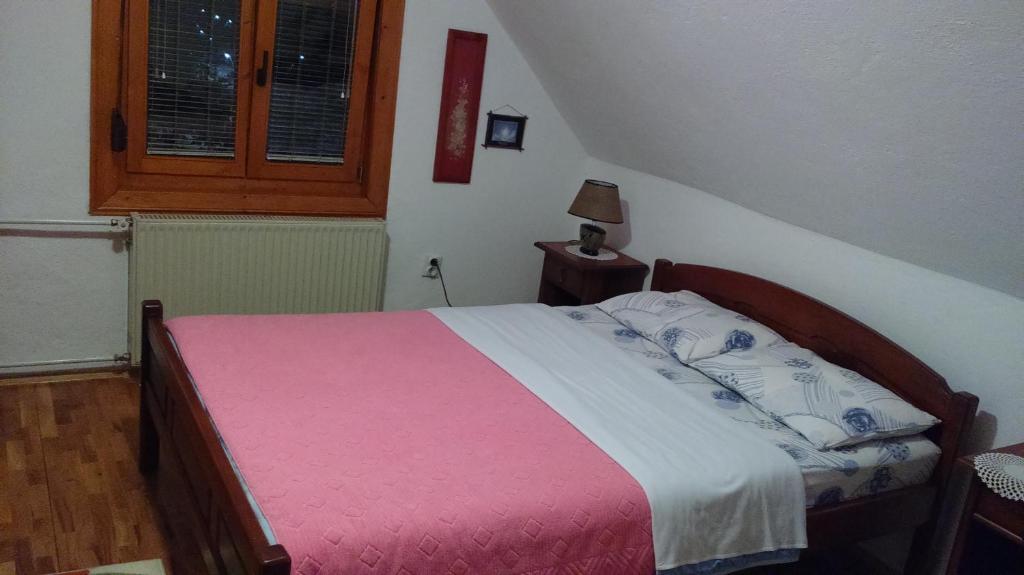 Postel nebo postele na pokoji v ubytování Guest House Milena