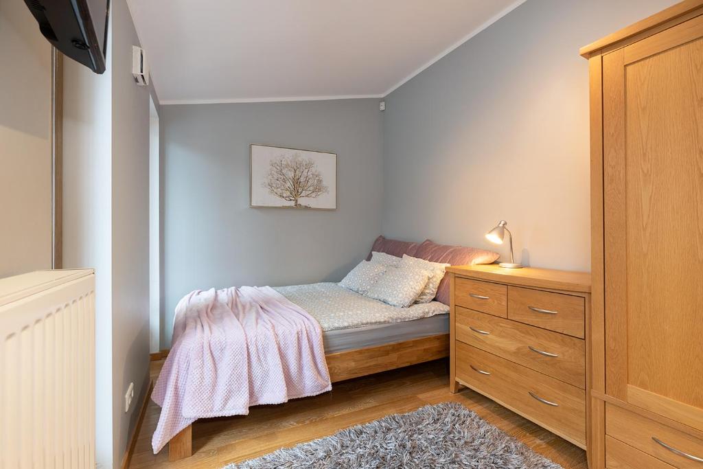 Postel nebo postele na pokoji v ubytování Rüütli Apartments in Tartu Old Town