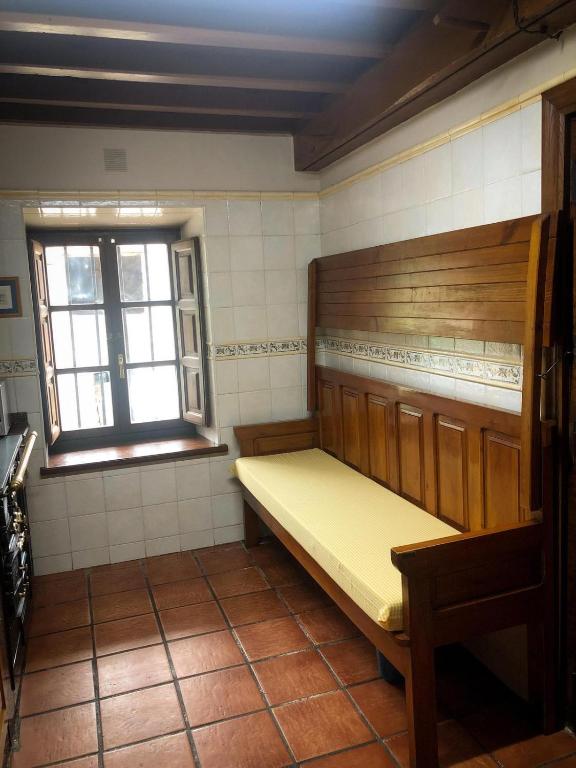 Postel nebo postele na pokoji v ubytování El Refugio del Busgosu