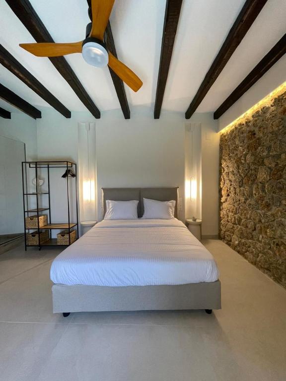 Postel nebo postele na pokoji v ubytování Villa Bournella