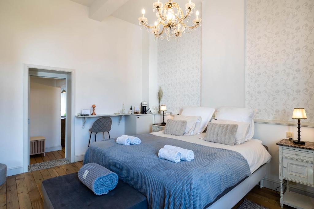 Postel nebo postele na pokoji v ubytování Huis van Loon