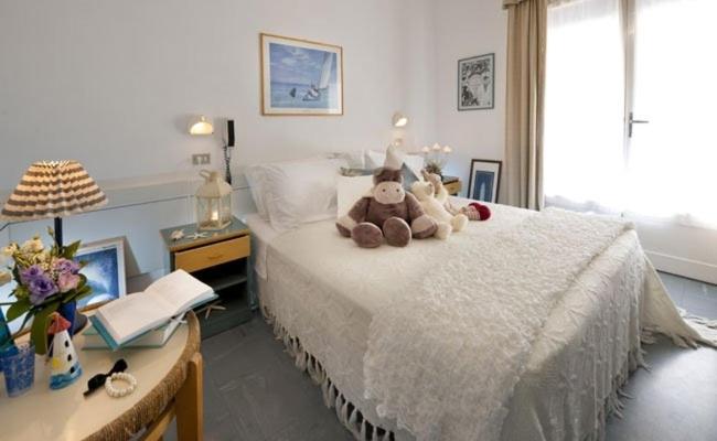 Postel nebo postele na pokoji v ubytování Hotel Solitude