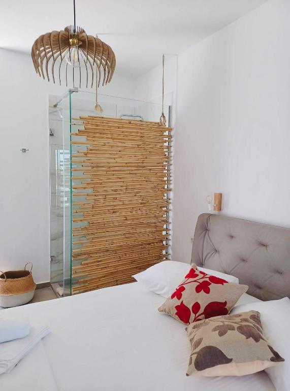 Postel nebo postele na pokoji v ubytování Fikas Hotel