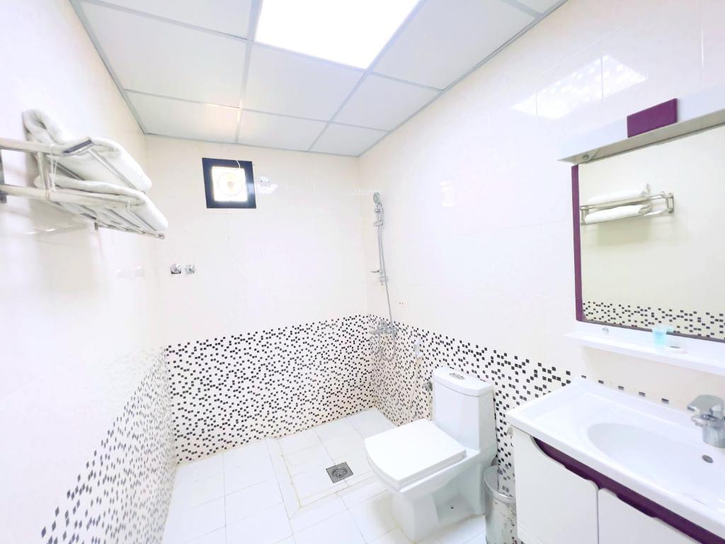 Vannituba majutusasutuses Al Taraf Hotel Apartment
