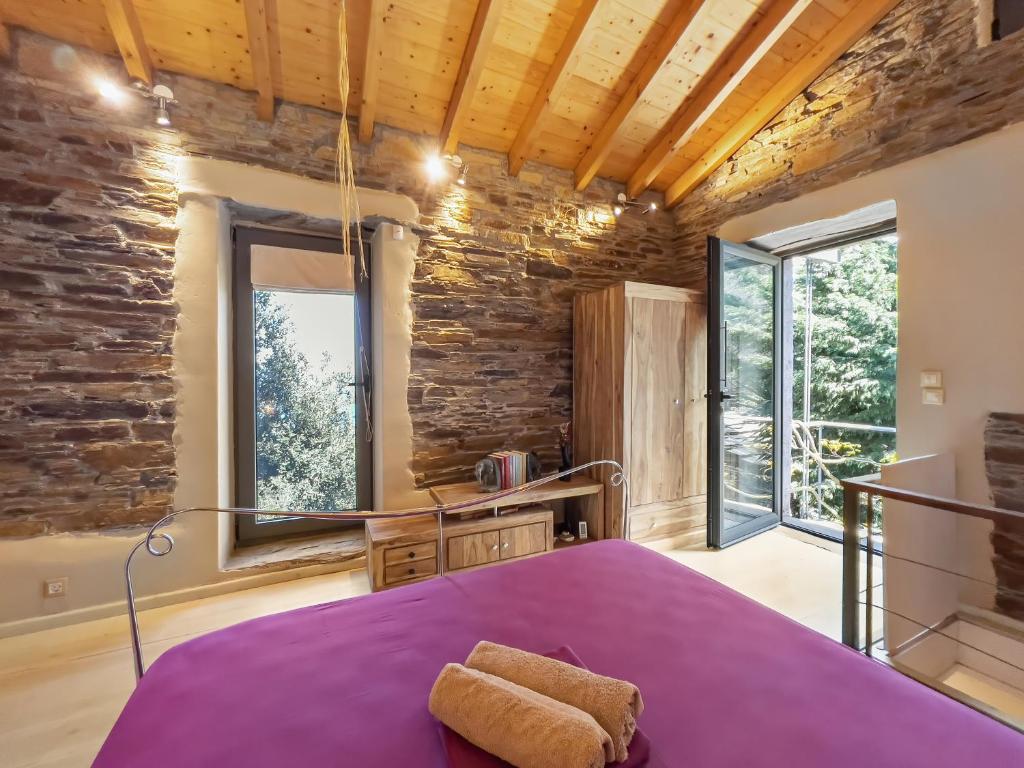 Posteľ alebo postele v izbe v ubytovaní Ikaria View Resort and Villa with Pool