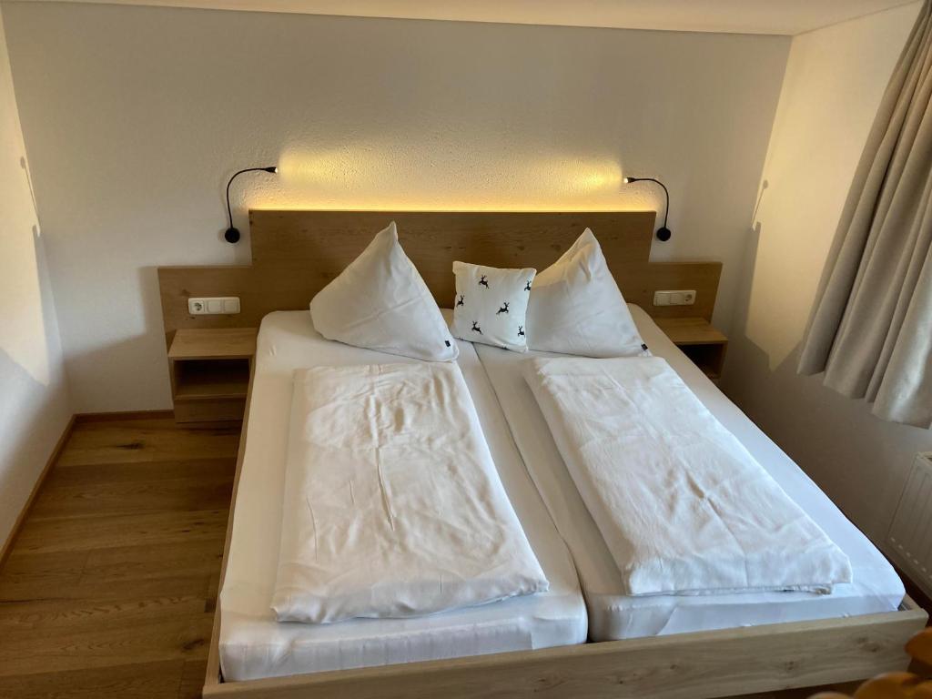 Postel nebo postele na pokoji v ubytování Zani Helga