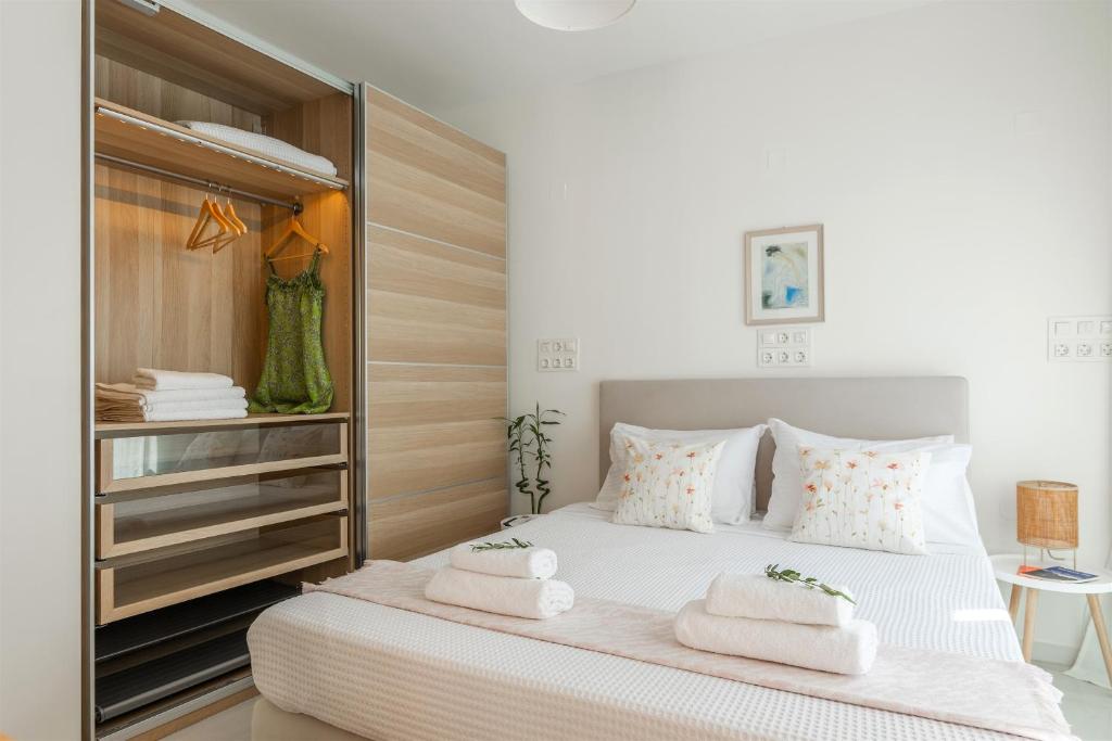 Łóżko lub łóżka w pokoju w obiekcie Theseus Zen Luxury Suite - Natural Living