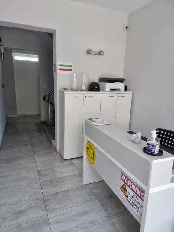 Kuchyň nebo kuchyňský kout v ubytování Alexion Apartments