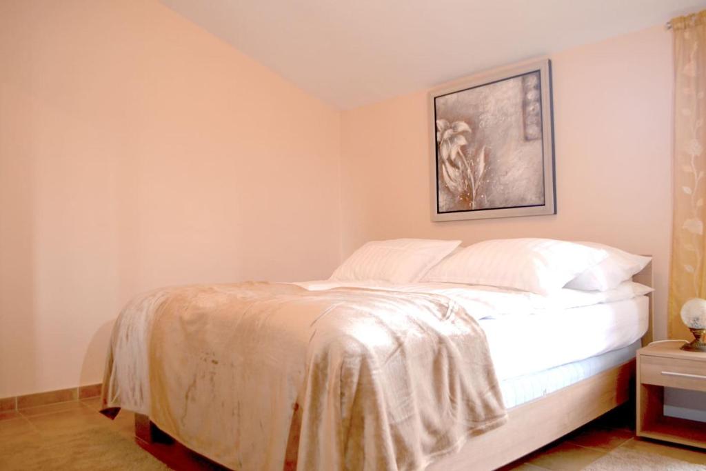 Postel nebo postele na pokoji v ubytování Wohnung mit Meerblick Romy