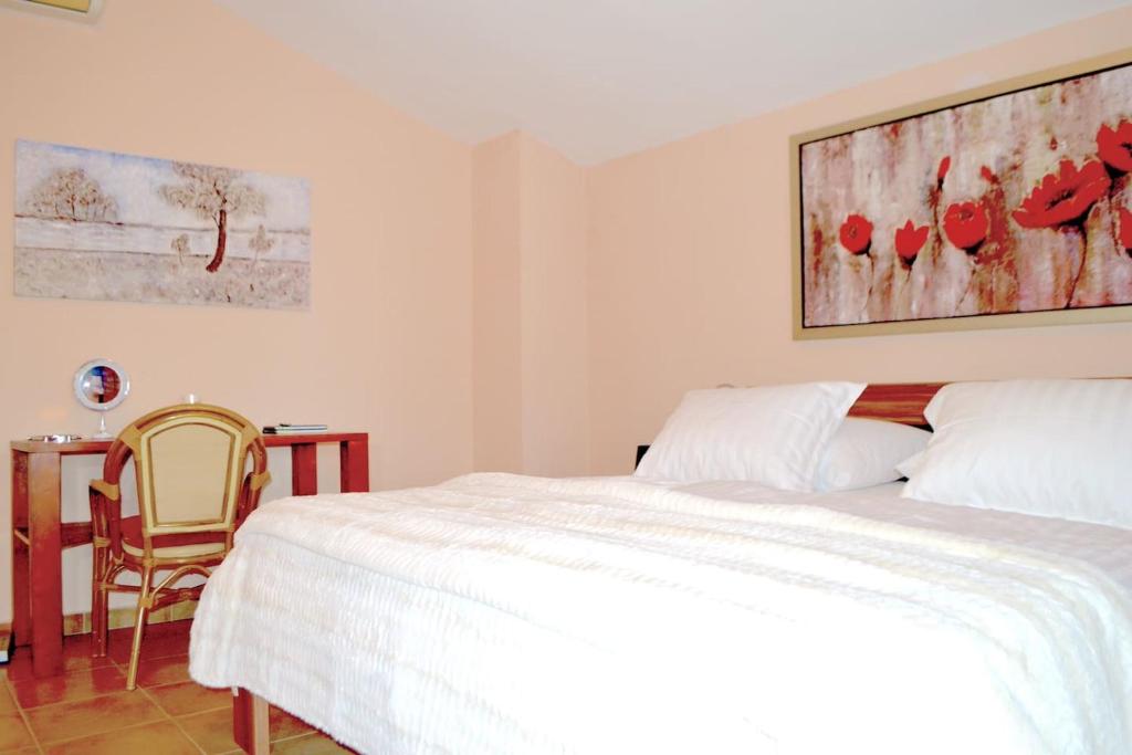 Postel nebo postele na pokoji v ubytování Wohnung mit Meerblick Romy