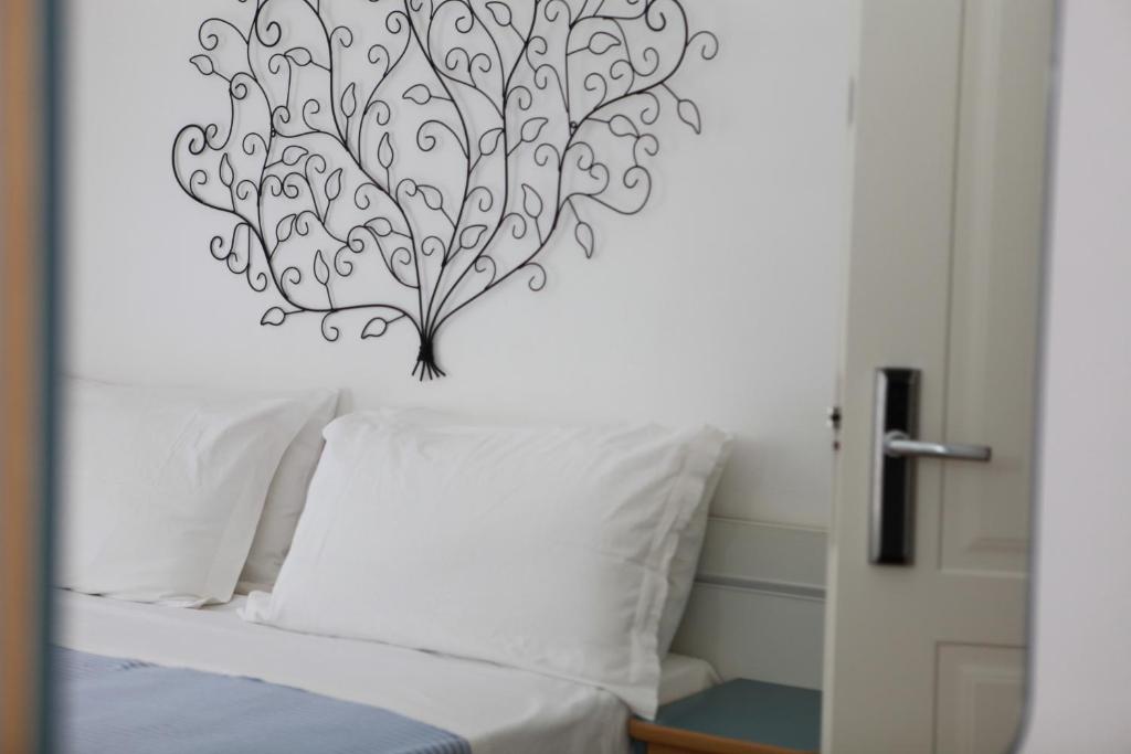 Postel nebo postele na pokoji v ubytování Hotel Solitude