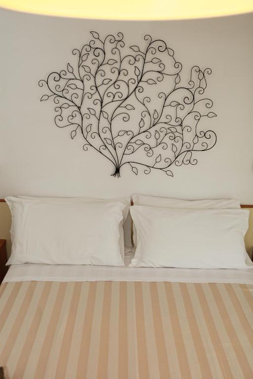 Postel nebo postele na pokoji v ubytování Hotel Solitude