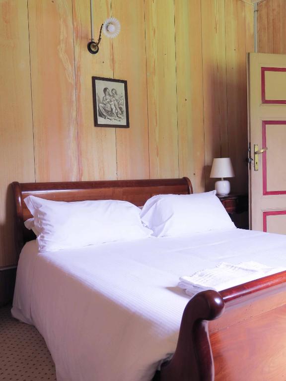 Postel nebo postele na pokoji v ubytování Hotel Villa Simplicitas
