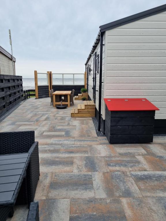 Balkón nebo terasa v ubytování Camping Zeezicht Verhuur Chalet aan Zee