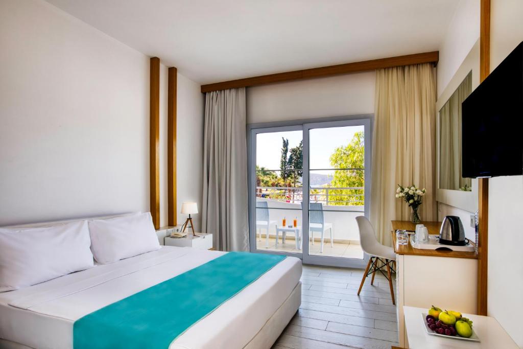 Postel nebo postele na pokoji v ubytování Labranda TMT Bodrum
