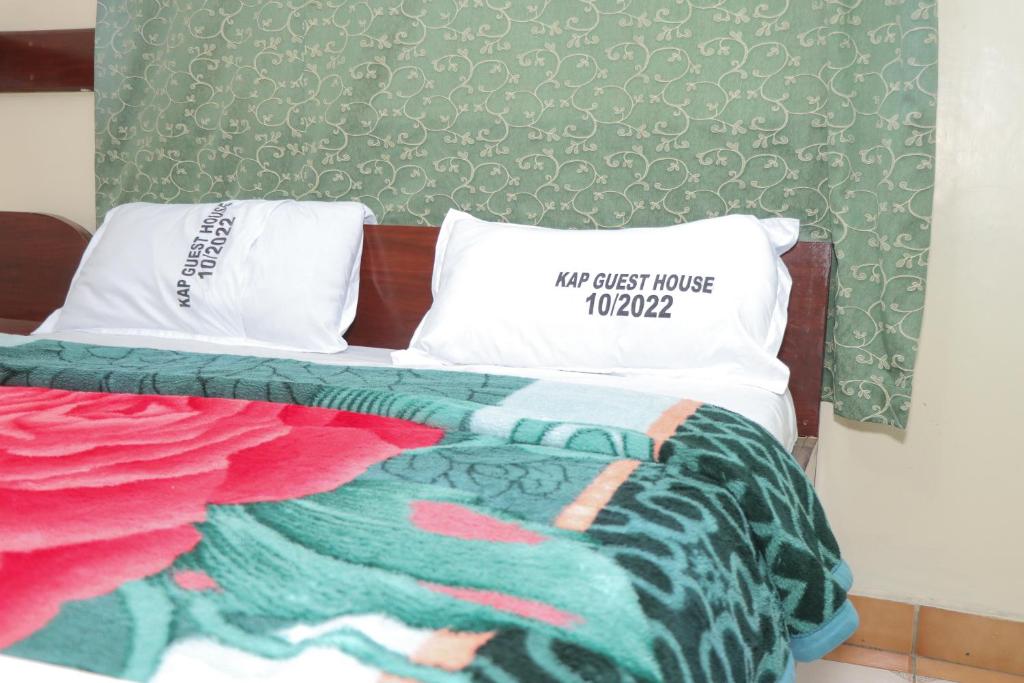 Postel nebo postele na pokoji v ubytování KAP Guest House
