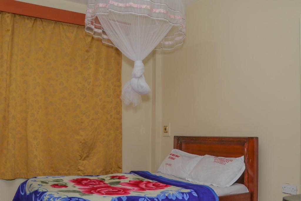 Postel nebo postele na pokoji v ubytování KAP Guest House