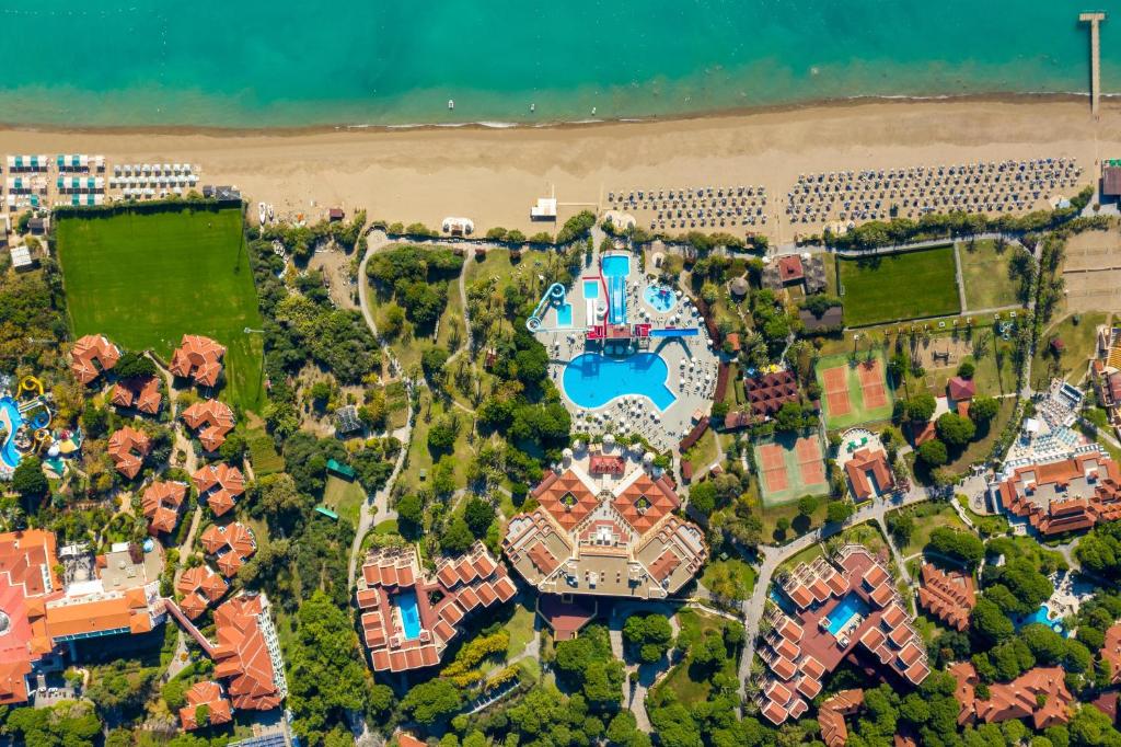 an aerial view of a mansion next to the beach at Aquaworld Belek in Belek