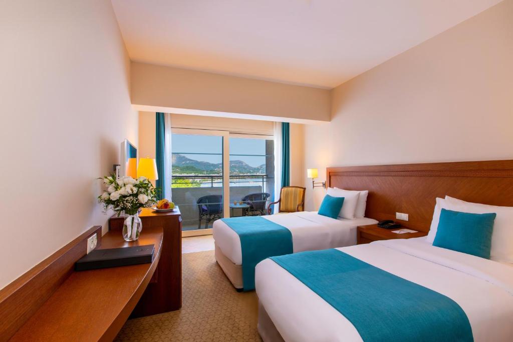 Postel nebo postele na pokoji v ubytování Labranda Mares Marmaris Hotel