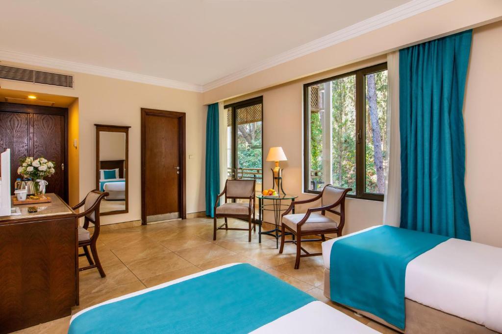 Postel nebo postele na pokoji v ubytování Labranda Mares Marmaris Hotel