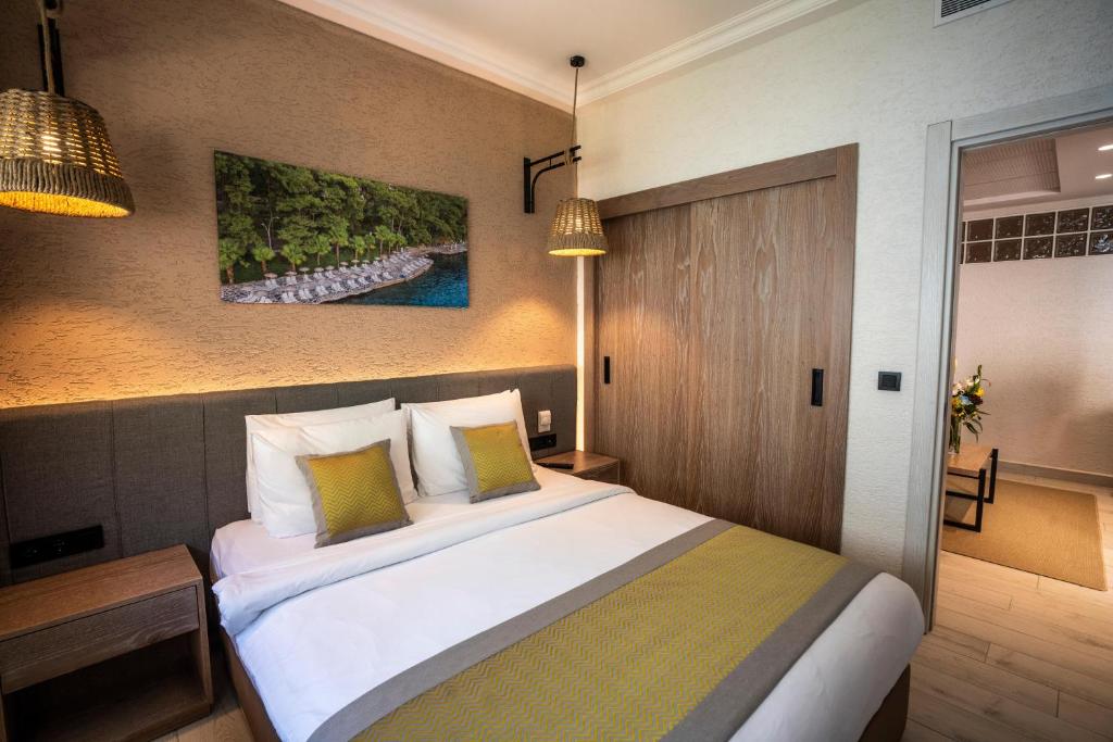 Postel nebo postele na pokoji v ubytování Labranda Mares Marmaris Hotel