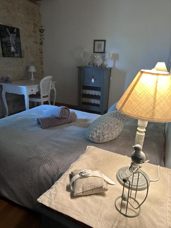 Postel nebo postele na pokoji v ubytování Gite de charme 6 pers avec SPA privé
