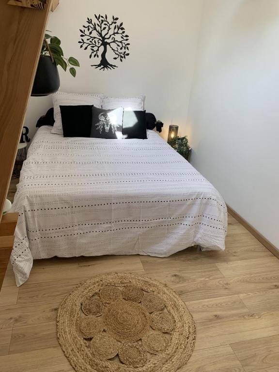 Postel nebo postele na pokoji v ubytování Gite de charme 6 pers avec SPA privé