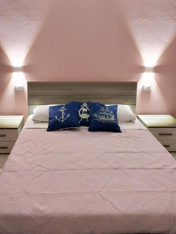 Postel nebo postele na pokoji v ubytování Noi e il Mare