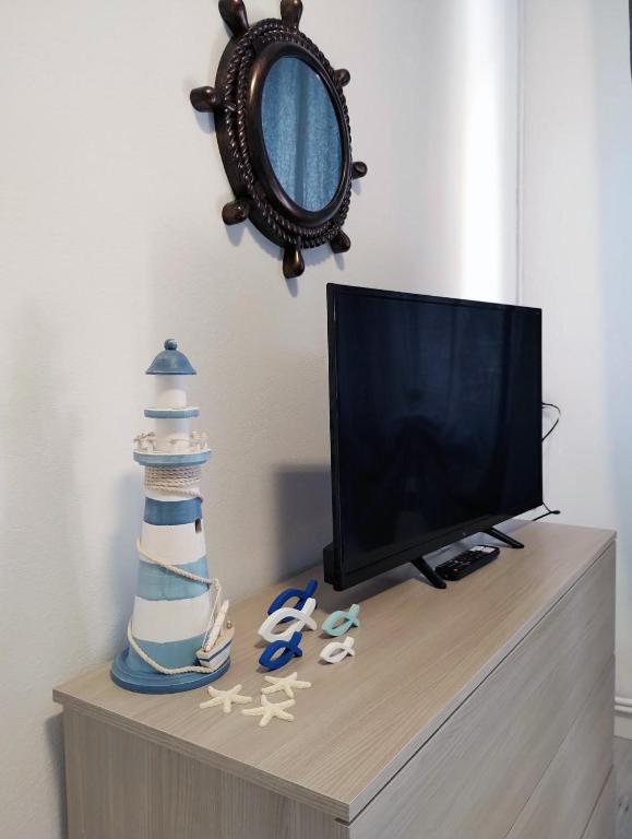 TV a/nebo společenská místnost v ubytování Noi e il Mare