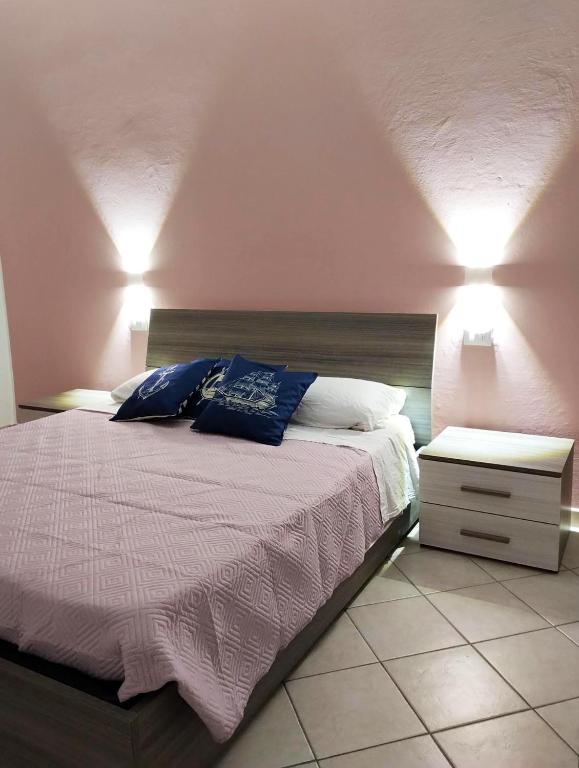 Postel nebo postele na pokoji v ubytování Noi e il Mare