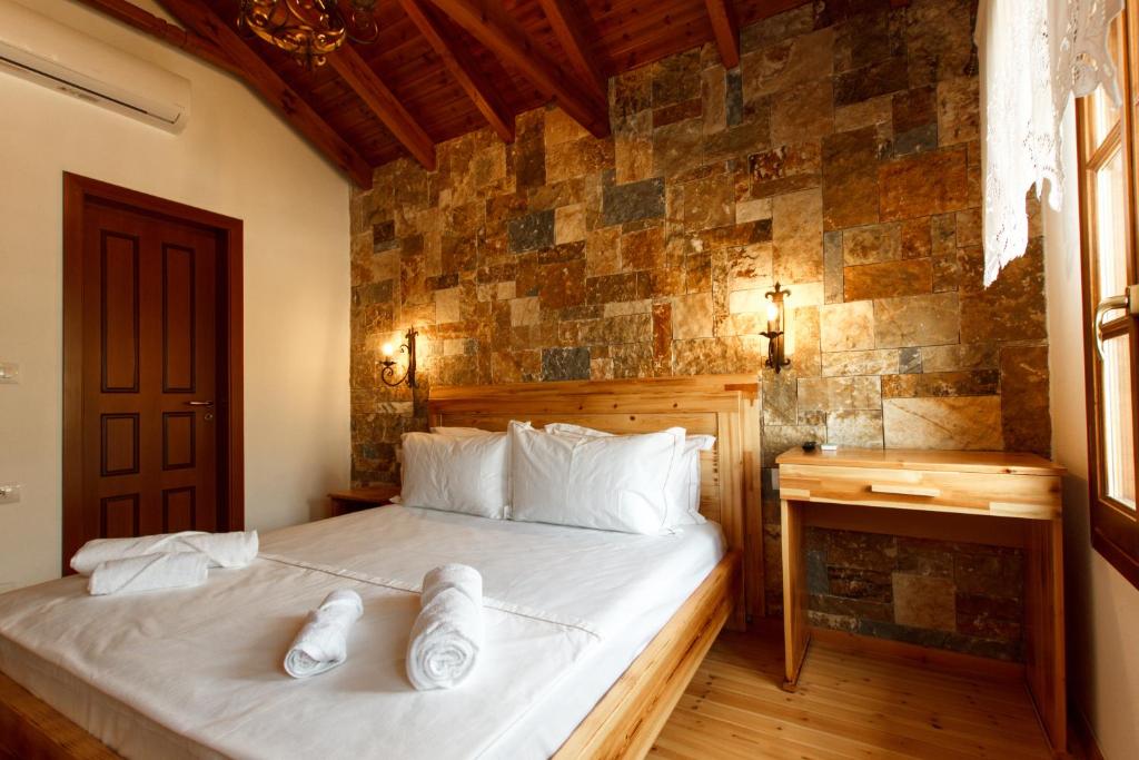 Letto o letti in una camera di Hotel Sarajet 1821