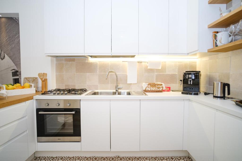 Kuchyň nebo kuchyňský kout v ubytování Welcome Ostuni b&b