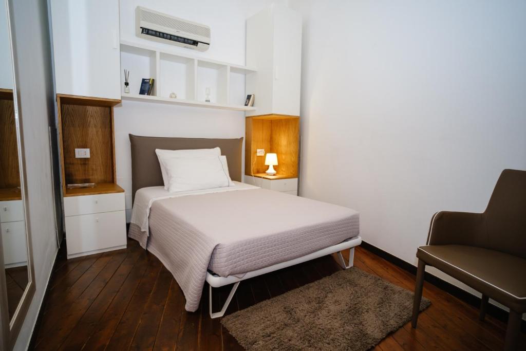 Postel nebo postele na pokoji v ubytování Welcome Ostuni b&b