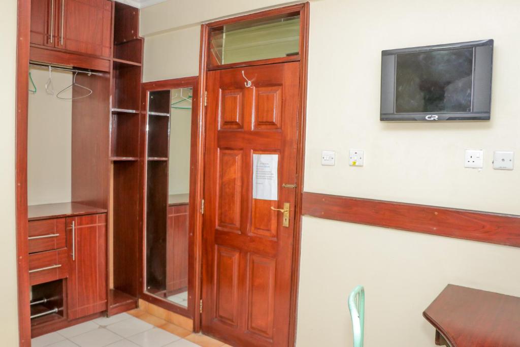 TV a/nebo společenská místnost v ubytování KAP Guest House