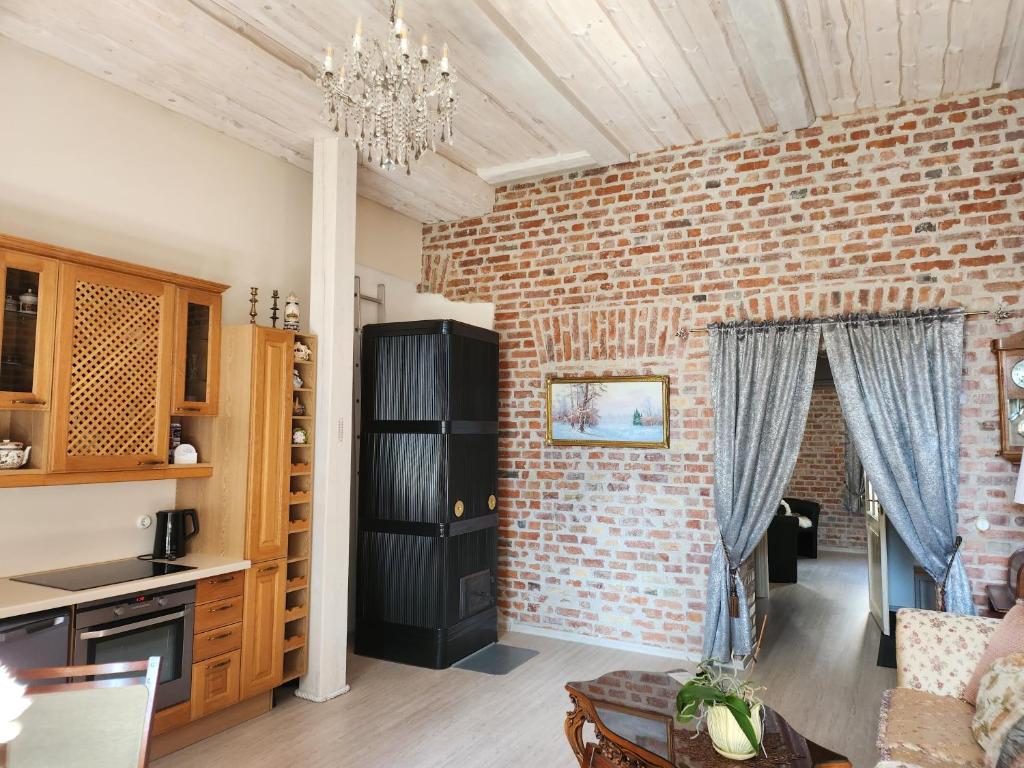 Kuchyň nebo kuchyňský kout v ubytování Viktoria Apartament
